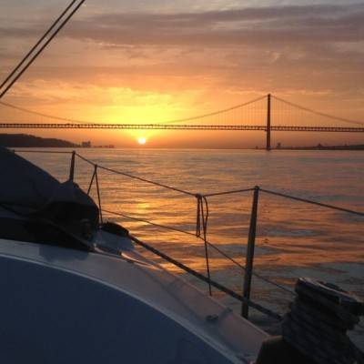 Lisbon Sunset seen from a boat in the river tagus