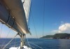 a beautiful view of the mountains and sea during a yacht charter