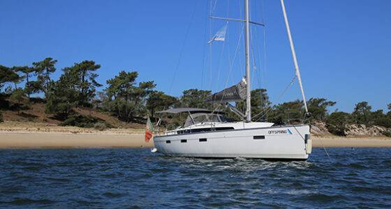 Bavaria 41 Cruiser for yacht charter in portugal witha beach behind
